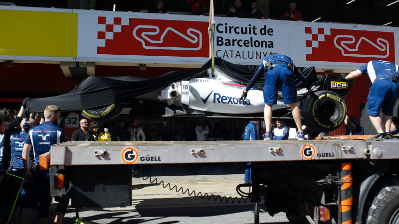Stroll’s car being brought in after Wednesday’s crash. Photo credit: Francisco Seco/AP Images